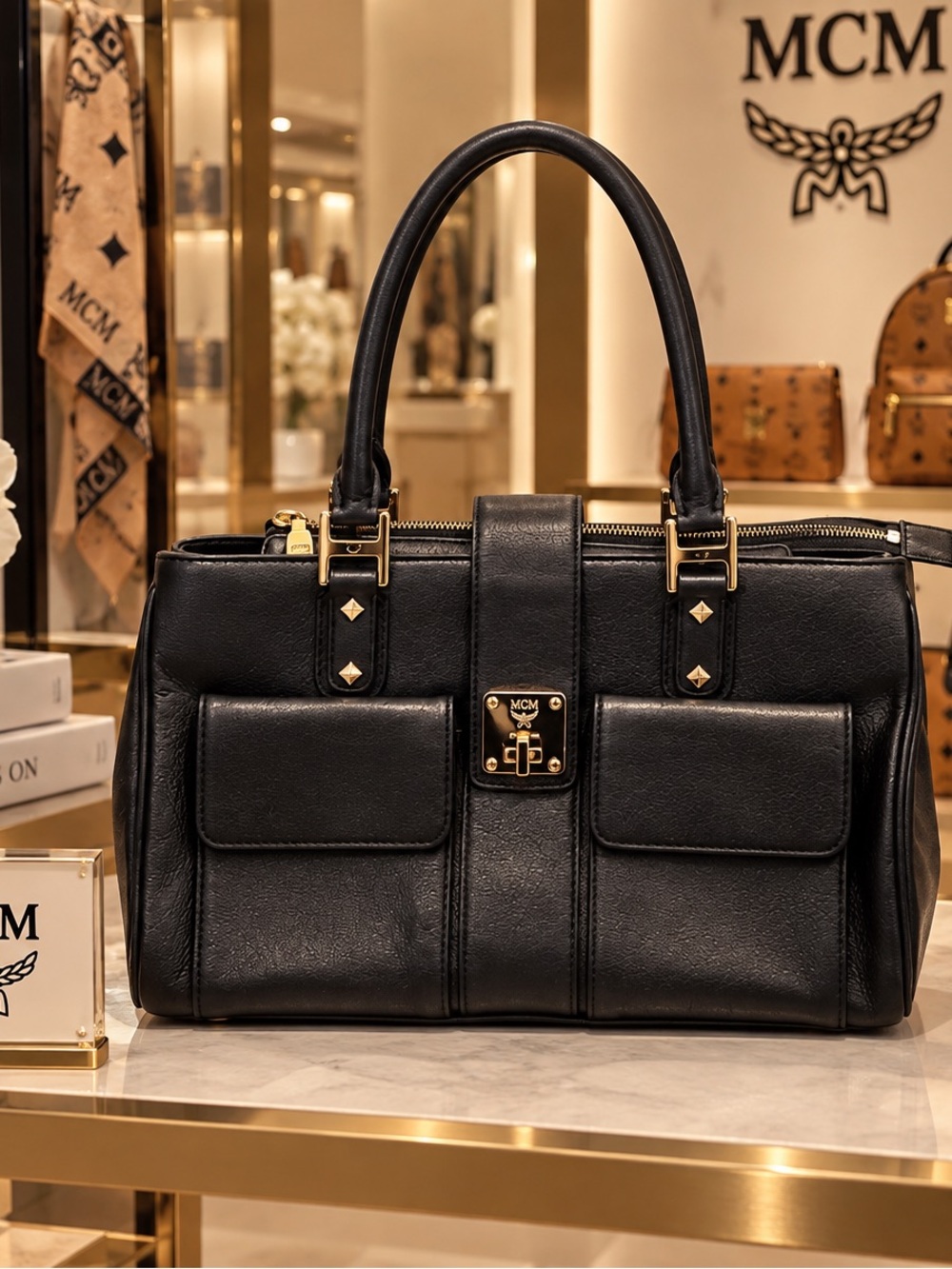 MCM Black Leather Double-Pocket Satchel with Gold Hardware